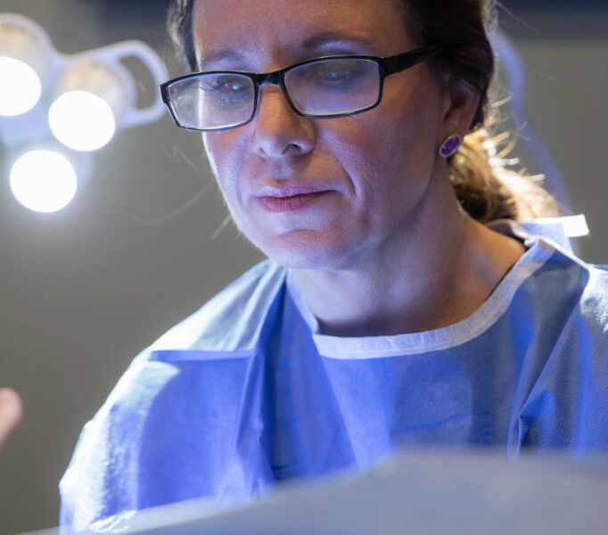 cosmetic gynecologist performing a procedure