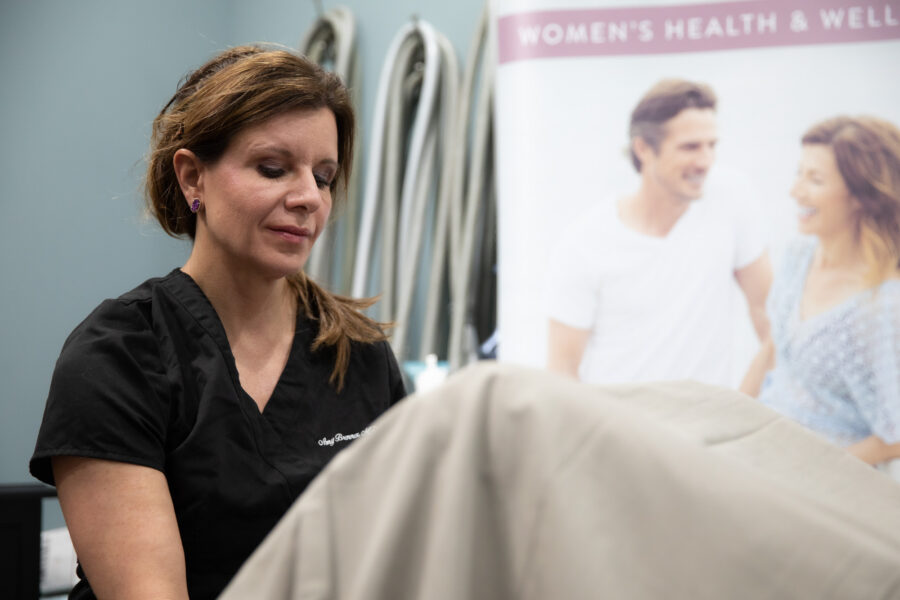 Dr. Amy Brenner administering Votiva, a treatment for women’s sexual wellness in Cincinnati.