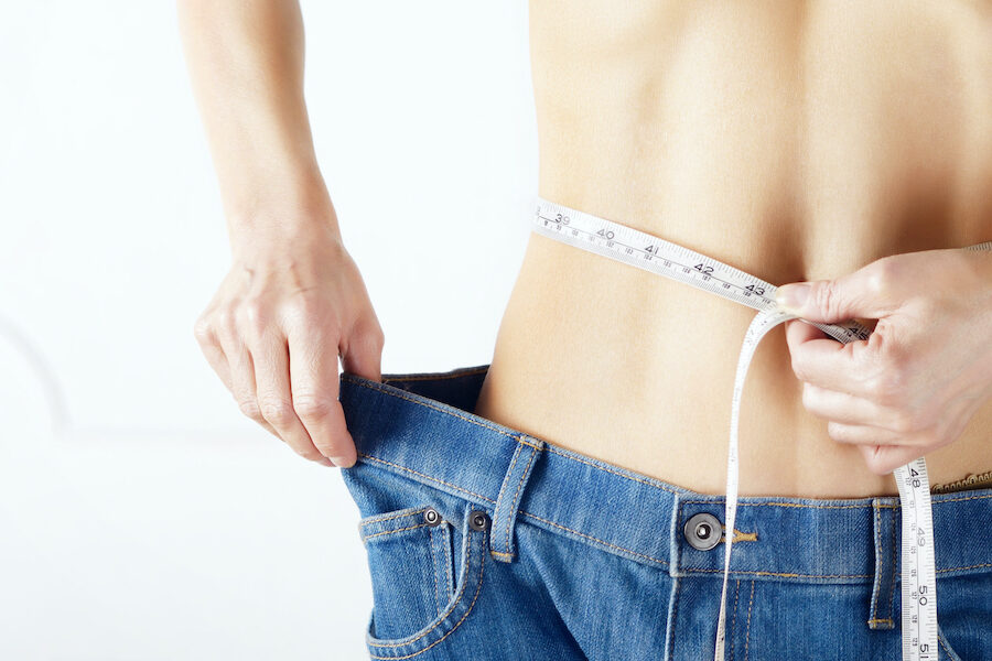 A woman sees results after learning the Best Way to Lose Belly Fat [Cincinnati]