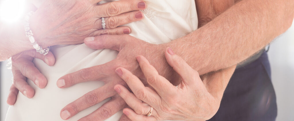 older man and women embracing after erectile dysfunction treatments in Cincinnati