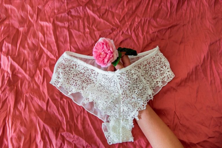 underwear and flower on a pink background