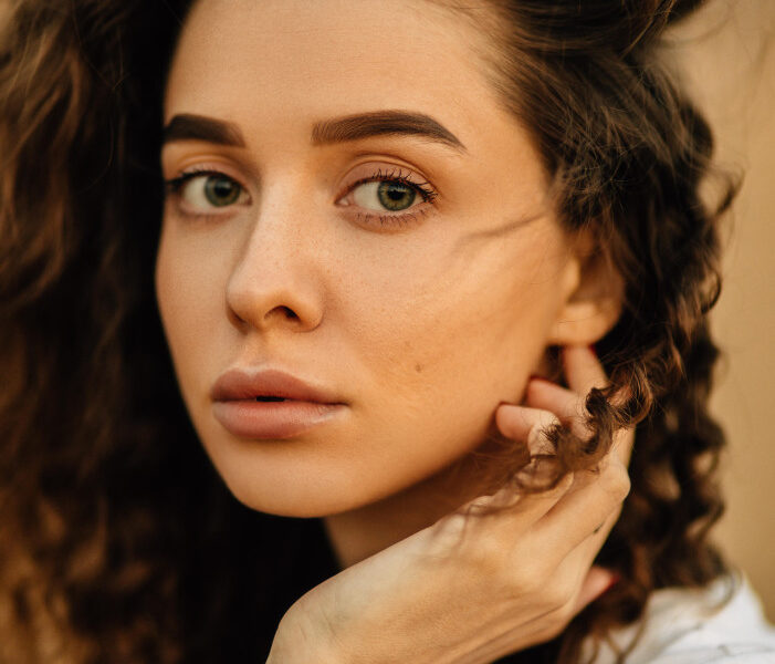 woman with glowing skin from a professional skin treatment in Cincinnati