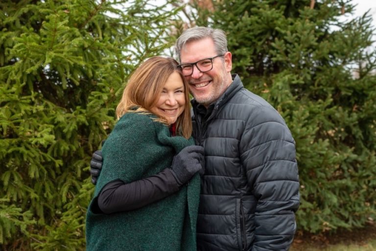 middle aged couple posing together outside after visiting a hormone doctor in Cincinnati