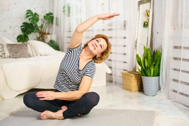 woman doing at home exercise for medical weight loss program
