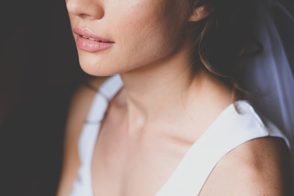 woman with clear skin from the best facial treatment in Cincinnati: DiamondGlow