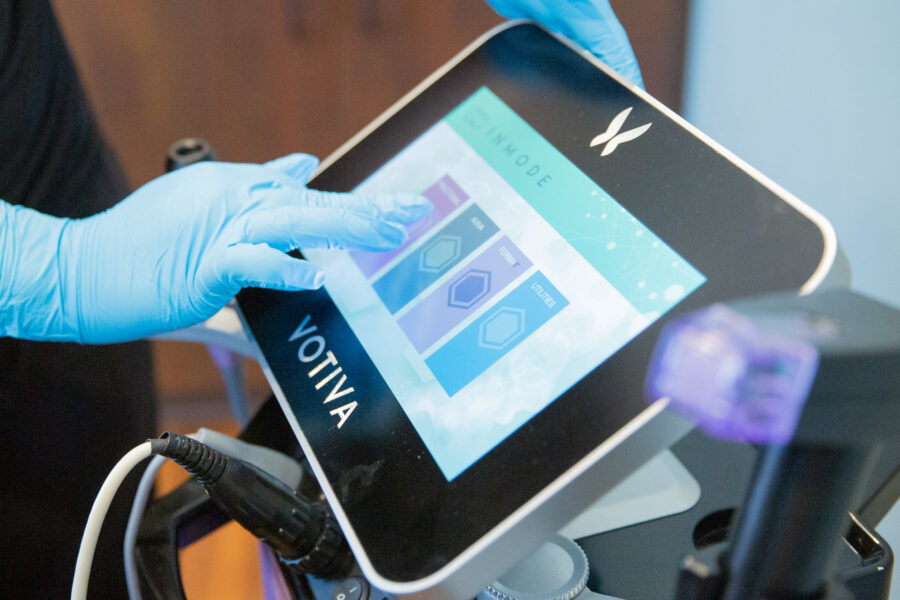 Close up of the Votiva platform control screen as a provider administers a rejuvenating treatment for vaginal health in Cincinnati.