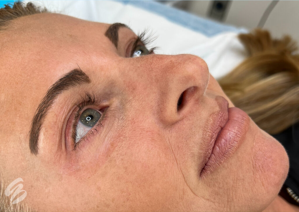 close up of woman's face before lash lift and tint