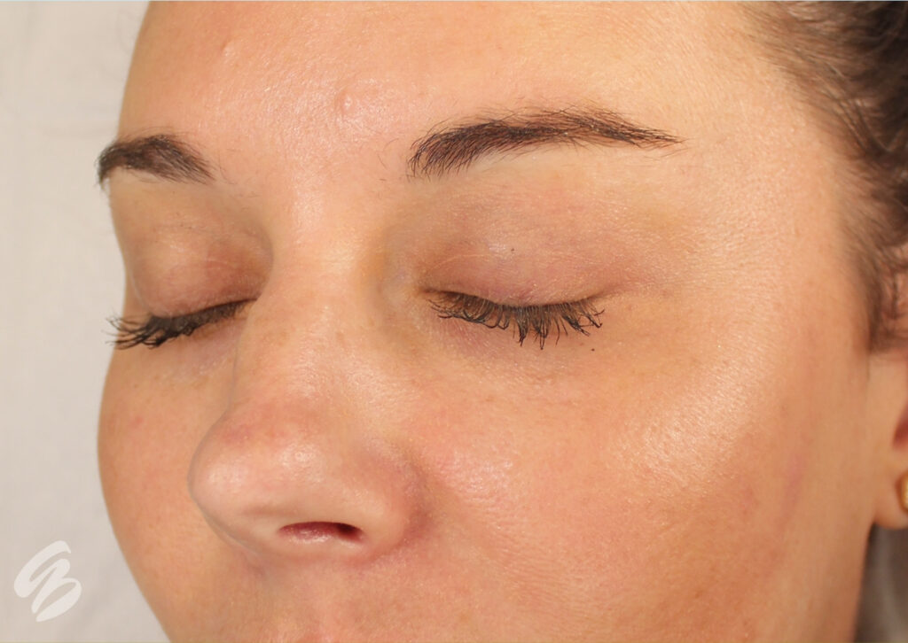 close up picture of upper face of woman focused on the eyebrows