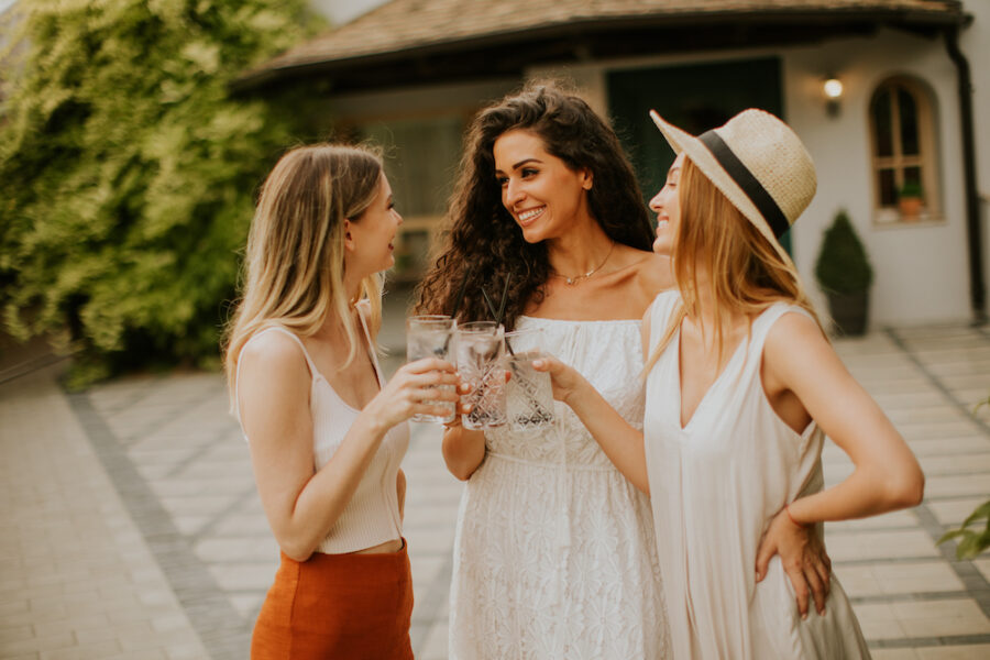 Smiling group of women after getting light therapy in Cincinnati