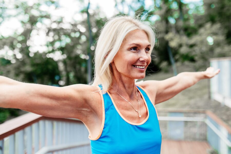 An older woman exercising after NAD+ therapy in Kenwood.