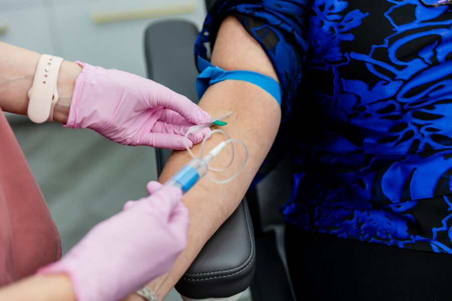 A provider at Amy Brenner, MD & Associates administering IV therapy as a form of regenerative medicine in Cincinnati.